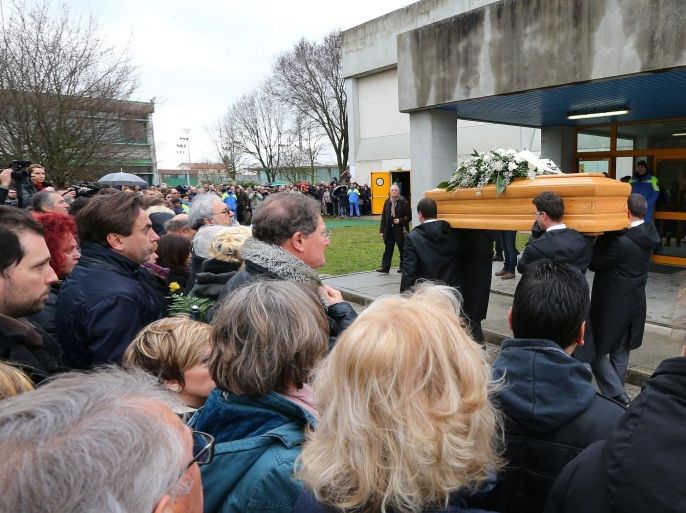 FILE - In this Friday, Feb. 12, 2016 file photo, the coffin of Giulio Regeni arrives at the church for his funeral service in Fiumicello, Northern Italy. Egypt denies its security services were behind the killing of Regeni. Late last month, the Interior Ministry announced it had killed members of a gang suspected of being behind his death. But that claim was largely dismissed in Italy, where many in the media accuse Egypt of a cover-up. Rome is demanding Cairo come clean and present detailed investigation results. (AP Photo/Paolo Giovannini, File)