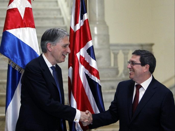British Secretary of State for Foreign and Commonwealth Affairs, Philip Hammond (L) shakes hands with his Cuban counterpart Bruno Rodriguez Parrilla (R) at the Foreign Ministry headquarters in Havana, Cuba, 28 April 2016. Hammond is in Cuba as part of his Latin American tour, which includes Colombia and Mexico.