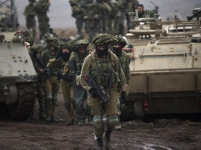 Israeli infantry soldiers from an armored unit take part in annual military training in the center of the Golan Heights, Israel, 27 October 2015. The Israeli Army on an annual basis conducts training in the Golan Heights, near the Israeli-Syrian border.