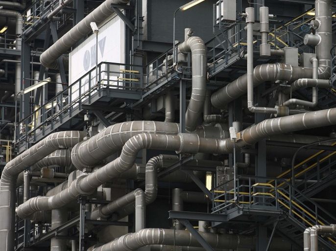 Pipes are pictured at the refinery of Austrian oil and gas group OMV in Schwechat, Austria, October 21, 2015. Oil majors are expected to post the worst set of earnings since the onset of the sector's downturn, with writedowns likely to dominate headlines as companies respond to a further drop in the price of crude in the third quarter. Between October 26 and November 12 the world's top listed oil and gas producers will reveal just how badly they've been hurt by the 17 percent quarter-on-quarter fall in prices. REUTERS/Heinz-Peter Bader