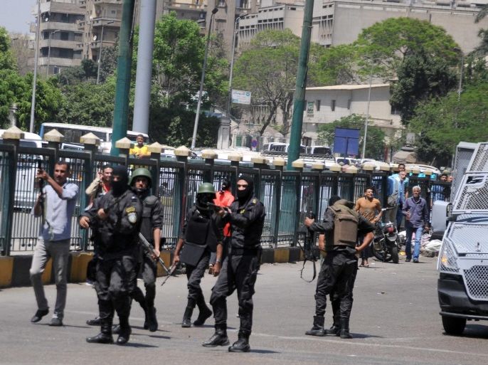 Egyptian Central Police Force fire tear gas canisters to disperse a protest in Giza Square, Giza, Egypt, 15 april 2016. Activists organised protests across the greater Cairo area against Egypt acknowledgement that the two islands of Tiran and Sanafir in the Gulf of Aqaba belong to Saudi Arabia and had only been placed under Egypt's control temporarily. EPA/TAREK WAJEH EGYPT OUT