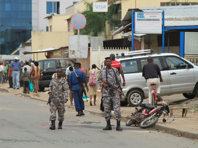 Policemen and soldiers patrol the streets after a grenade attack of Burundi's capital Bujumbura, February 3, 2016. At least one person was killed in a grenade attack on a bar in Burundi on Monday night, witnesses said, in more violence since the African Union backed away from sending in peacekeepers without the government's consent. REUTERS/Jean Pierre Aime Harerimama