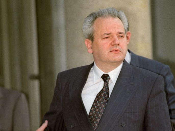 In this photo taken on March 11, 1993 Serbian President Slobodan Milosevic leaves the Elysee Palace in Paris after a meeting with French President Mitterrand and the two co-Presidents of the Bosnian Peace Conference, Lord Owen and Cyrus Vance. Bosnia on April 6, 2012 marks 20 years since the start of a war that has left the country'