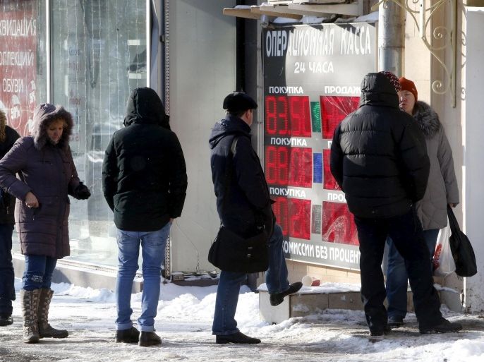 People wait in line to get into a currency exchange office in Moscow, Russia, in this January 21, 2016 file photo. To match RUSSIA-ECONOMY/ REUTERS/Sergei Karpukhin/Files