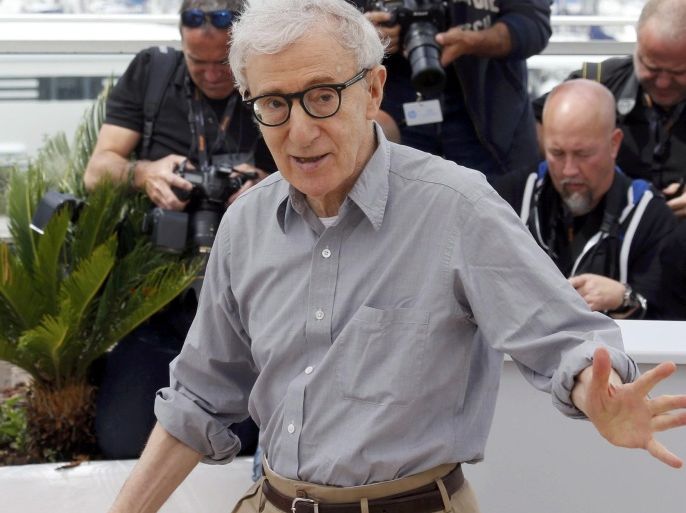 Director Woody Allen gestures as he poses during a photocall for the film "Cafe Society" out of competition, before the opening of the 69th Cannes Film Festival in Cannes, France, May 11, 2016. REUTERS/Regis Duvignau