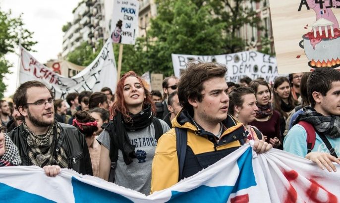 France workers and students unions demonstrate against the French Government's labor law reform bill in Paris, France, 12 May 2016. The march takes place in an atmosphere of massive protest again French labor reform project.