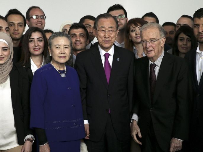 The United Nations Secretary-General, Ban Ki-moon (C), flanked by his wife, Yoo Soon-taek (C-L) and former Portuguese President, Jorge Sampaio (C-R), during a meeting with Syrian students living and studying in Portugal, Lisbon, Portugal, 12 May 2016.