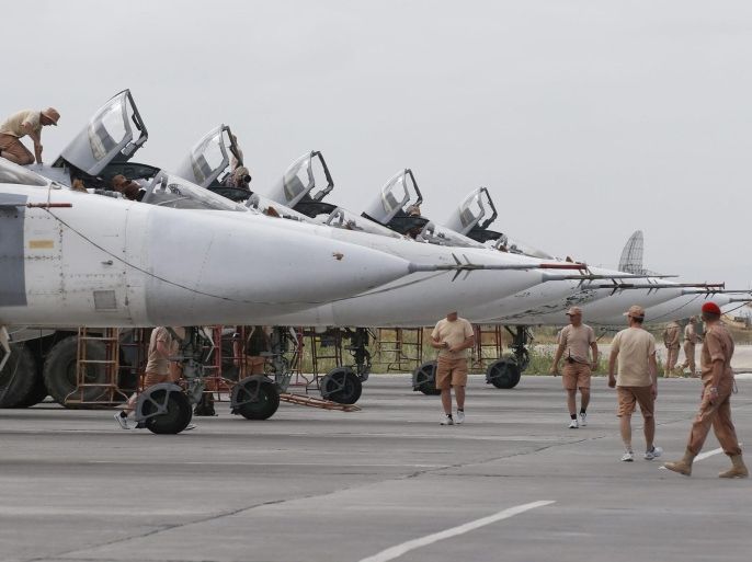 Russian technicians maintain Su-24 bomber at Hmeimym airbase in Latakia province, Syria, 04 May 2016. Hmeimym airbase serves as the base of operation for the Russian air force in Syria. The United States and Russia have agreed to extend the cease-fire in Syria to the city of Aleppo, the US State Department reported on 04 May.