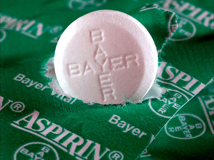 epa000390317 An Aspirin tablet by chemical and pharmaceutical group Bayer lies on its wrapping in Duesseldorf, Germany, 15 March 2005. After the largest rebuilding and the highest losses in the company's history Bayer is again on the road to success. The operating profit is supposed to be increased 20 per cent during the current fiscal year, announced the company during the balance press conference in Leverkusen, Germany, 15 March 2005. EPA/MARTIN GERTEN