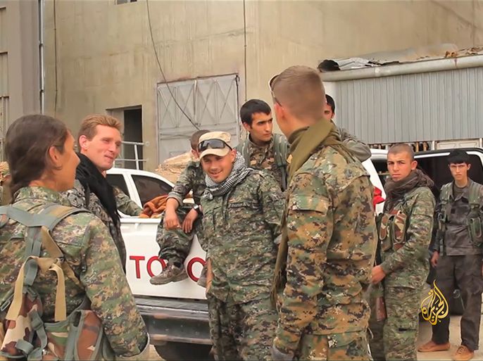 مناوشات الرقة بين تنظيم الدولة والأكراد المدعومين أميركيا