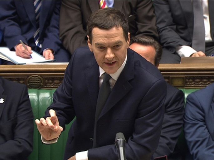 A still image from video shows Britain's Chancellor of the Exchequer George Osborne (C) gesturing as he delivers the Autumn Statement to Parliament in London December 3, 2014. Osborne said on Wednesday he would miss his short-term budget deficit targets but could afford tax cuts for home-buyers, offering some voter relief from his austerity push ahead of elections. REUTERS/UK Parliament via REUTERS TV (BUSINESS POLITICS) NO COMMERCIAL OR BOOK SALES. NO SALES. FOR EDITORIAL USE ONLY. NOT FOR SALE FOR MARKETING OR ADVERTISING CAMPAIGNS