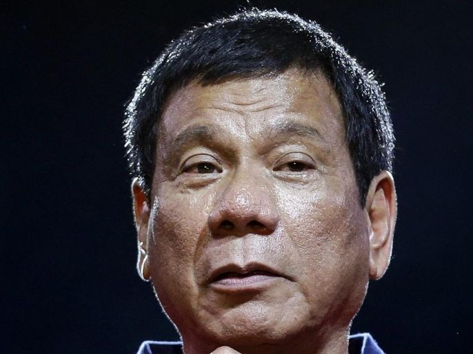A picture made available on 12 May 2016 shows Philippine President-elect Rodrigo Duterte speaking to supporters during a rally in Manila, Philippines, 07 May 2016. The administration of incoming Philippine President Rodrigo Duterte has announced at a conference in Davao City, southern Philippines, on 12 May 2016 that the first priority of the Transition Committee will be to rebuild the public's trust in police forces.