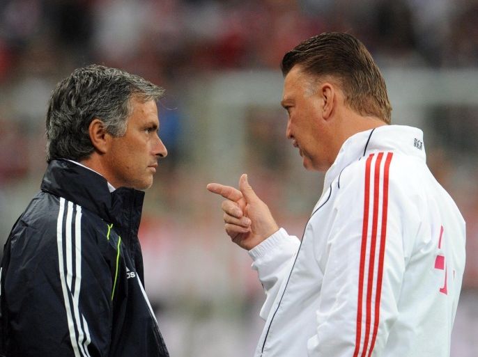 (FILE) A file photo dated 13 August 2010 shows Bayern Munich head coach Louis van Gaal (R) with Real Madrid coach Jose Mourinho prior to the soccer friendly match between FC Bayern Munich and Real Madrid at the Allianz Arena stadium in Munich, Germany. British media reports on 21 May 2016 state that Jose Mourinho will take over from Louis Van Gaal as manager of Manchester Unted. It is expected that a formal announcement will be made next week.