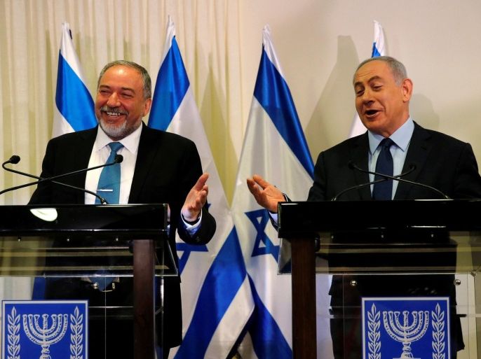 Avigdor Lieberman, head of far-right Yisrael Beitenu party, (L) and Israeli Prime Minister Benjamin Netanyahu deliver statements to the media after signing a coalition deal to broaden the government's parliamentary majority, at the Knesset, the Israeli parliament in Jerusalem May 25, 2016. REUTERS/Ammar Awad
