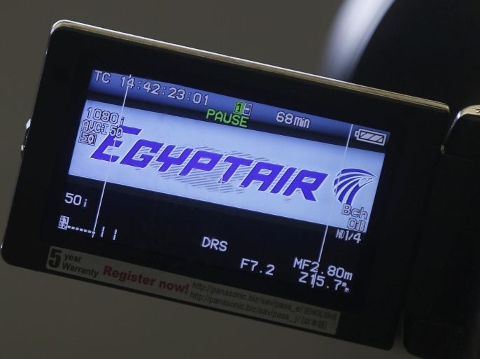 The company logo is displayed on a video camera screen at the Egyptair desk at Charles de Gaulle airport, after an Egyptair flight disappeared from radar during its flight from Paris to Cairo, in Paris, France, May 19, 2016. REUTERS/Christian Hartmann
