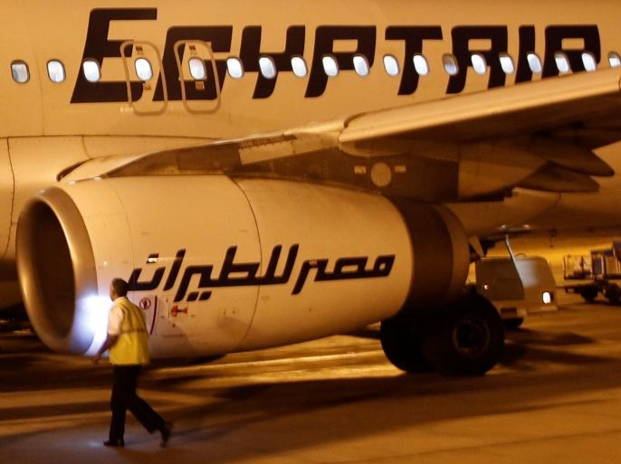 A security airport checks an Egyptair plane after arrival from Cairo to Luxor International Airport, Egypt May 19, 2016. REUTERS/Amr Abdallah Dalsh