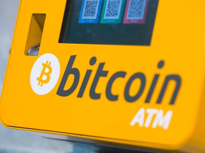 File - This is a Oct. 16, 2015 file photo of a Bitcoin ATM. An Australian man long thought to be associated with the digital currency Bitcoin has publicly identified himself as its creator. BBC News said Monday, May 2, 2016 that Craig Wright told the media outlet he is the man previously known by the pseudonym Satoshi Nakamoto. The computer scientist, inventor and academic says he launched the currency in 2009 with the help of others. (Dominic Lipinski/PA via AP, File) UNITED KINGDOM OUT