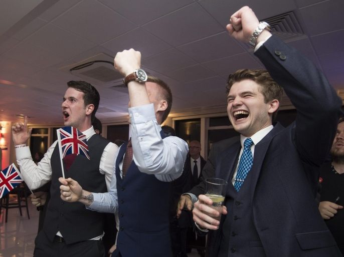 People react to a vote count results screen at an 'Leave.EU Referendum Party' in London, Britain, 23 June 2016. Britons await the results on whether they remain in, or leave the European Union (EU) after a referendum on 23 June.