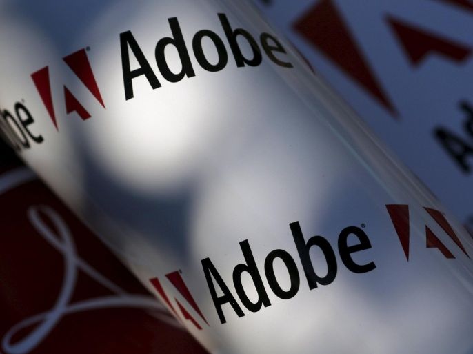 Adobe company logos are seen in this file picture illustration taken in Vienna July 9, 2013. Adobe is expected to announce Q3 results on September 17. REUTERS//Leonhard Foeger/Files GLOBAL BUSINESS WEEK AHEAD PACKAGE - SEARCH 'BUSINESS WEEK AHEAD SEPTEMBER 14' FOR ALL 27 IMAGESS