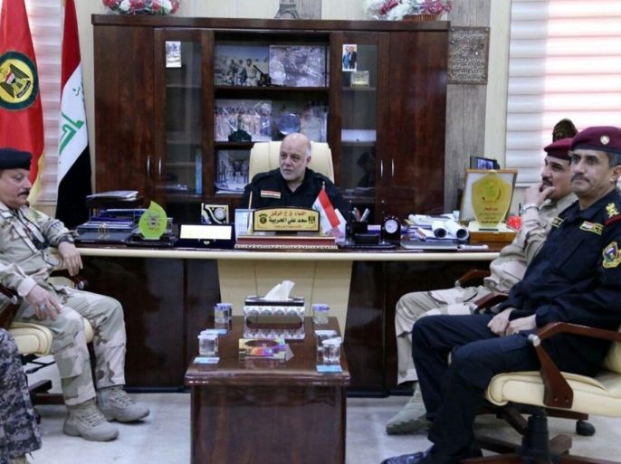 A handout picture released by Iraqi prime minister's office shows Iraqi Prime Minister Haider al-Abadi (C) meeting with Iraqi military officers during his visit to a military base near Fallujah city, western Iraq, 23 May 2016. The Iraqi Army on 23 May began an offensive to take back the city of Fallujah, located around 50 kilometers east of Baghdad in the western province of Al Anbar, from the hands of the Islamic State (IS). EPA/IRAQI PRIME MINISTER OFFICE/HAND