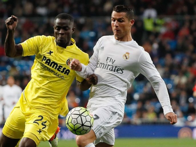 (FILE) A file photo dated 20 April 2016 shows Real Madrid's Cristiano Ronaldo (R) in action against Eric Bailly (L) of Villarreal during the Spanish Liga Primera Division soccer match played at the Santiago Bernabeu stadium, in Madrid, Spain. British media reports on 07 June 2016 state that Manchester United have agreed to sign Eric Bailly from Villarreal for a fee of about 30 million GBP (38.4 million euros). EPA/JuanJo Martin *** Local Caption *** 52713202