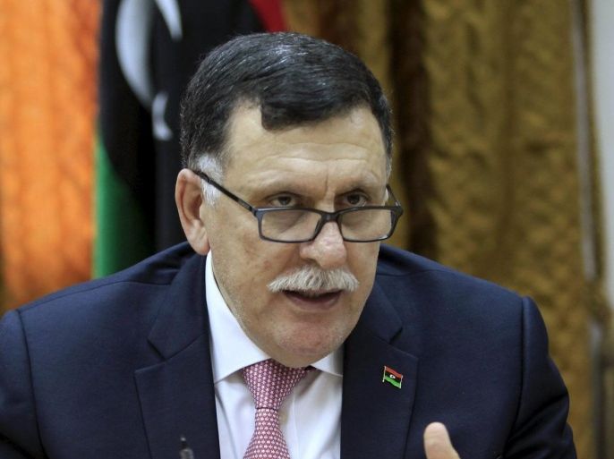 Fayez Seraj, Libyan prime minister-designate under the proposed unity government, attends a meeting with officials of municipal council of Tripoli in Tripoli, Libya, March 31, 2016. REUTERS/Ismail Zitouny