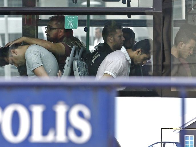Turkish plain cloth policemen accompany detainee soldiers the 15 July failed coup attempt at a bus as they arrive to Istanbul court , in Istanbul, Turkey, 20 July 2016. Turkish Muslim cleric Fethullah Gulen, living in self-imposed exile in the USA, has been accused by Turkish President Recept Tayyip Erdogan of allegedly orchestrating the 15 July failed coup attempt. At least 290 people were killed and almost 1,500 injured amid violent clashes on July 15 as certain milit