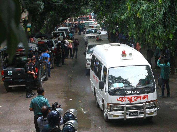Police ambulances carry bodies of the foreigners from the Holey Artisan Bakery in Dhaka, Bangladesh, 02 July 2016. The death toll rises to 22 including 20 foreigners while six gunmen have been shot and killed during an operation to end a hostage situation by military commandos, while two policemen were killed by the gunmen earlier and more than 20 people were injured. The operation team has managed to rescue 13 hostages, as Prime Minister Sheikh Hasina announced a two-d