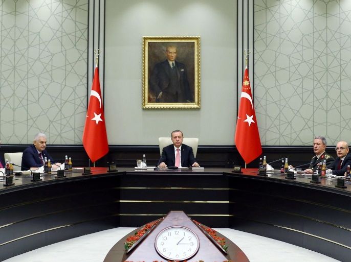 Turkish President Tayyip Erdogan (C) chairs a National Security Council (MGK) meeting at the presidential palace in Ankara, Turkey, July 20, 2016. Kayhan Ozer/Presidential Palace/Handout via REUTERS ATTENTION EDITORS - THIS PICTURE WAS PROVIDED BY A THIRD PARTY. FOR EDITORIAL USE ONLY. NO RESALES. NO ARCHIVE.