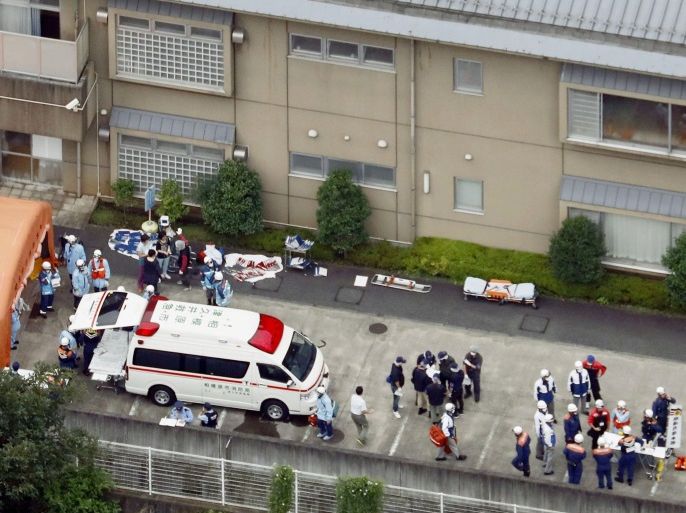 Police officers and rescue workers are seen in a facility for the disabled, where at least 19 people were killed and as many as 20 wounded by a knife-wielding man, in Sagamihara, Kanagawa prefecture, Japan, in this photo taken by Kyodo July 26, 2016. Mandatory credit Kyodo/via REUTERS.ATTENTION EDITORS - THIS IMAGE WAS PROVIDED BY A THIRD PARTY. EDITORIAL USE ONLY. MANDATORY CREDIT. JAPAN OUT. NO COMMERCIAL OR EDITORIAL SALES IN JAPAN.