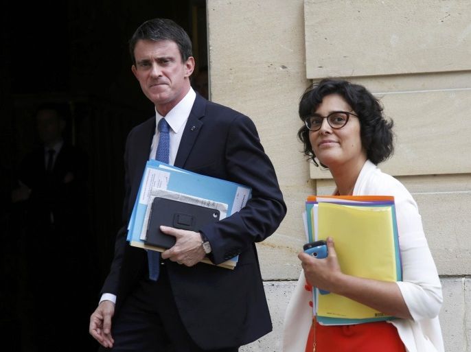 French Prime Minister Manuel Valls (L) and Labour Minister Myriam El Khomri arrive before a series of meetings about French labour law reforms with trade unions leaders at the Hotel Matignon in Paris, France, June 29, 2016. REUTERS/Jacky Naegelen