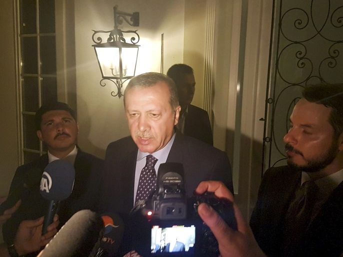 Turkish President Tayyip Erdogan speaks to media in the resort town of Marmaris, Turkey, July 15, 2016. REUTERS/Kenan Gurbuz