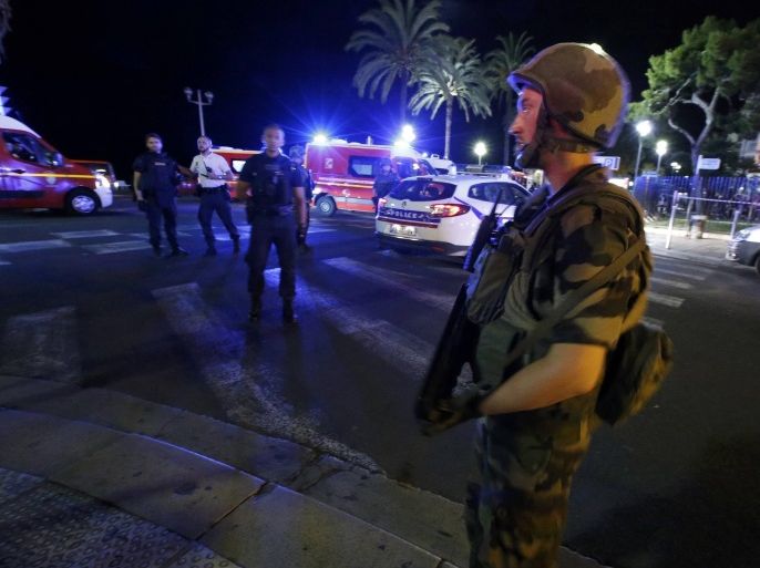 French soldiers cordon the area after at least 30 people were killed in Nice, France, when a truck ran into a crowd celebrating the Bastille Day national holiday July 14, 2016. REUTERS/Eric Gaillard