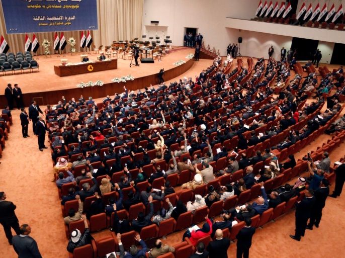 FILE PHOTO Members of the Iraqi parliament gather to vote on Iraq's new government at the parliament headquarters in Baghdad, September 8, 2014. REUTERS/Thaier Al-Sudani/File Photo