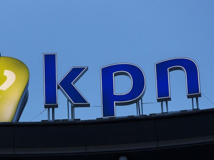The company logo of Dutch telecoms group KPN is seen on the headquarters in the Hague February 4, 2014. Dutch telecoms group KPN on Tuesday reported worse than expected core profit in the fourth quarter, as revenues from its Dutch mobile phone business fell at a faster rate than in the previous quarter. REUTERS/Michael Kooren (NETHERLANDS - Tags: BUSINESS TELECOMS)