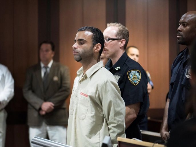 Oscar Morel appears for an arraignment at the Queens Criminal Court for his alleged involvement in the murder of Imam Maulama Akonjee and Thara Uddin in Queens, New York, U.S., August 16, 2016. REUTERS/POOL/Dennis A. Clark