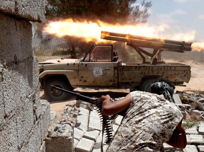 Libyan forces allied with the U.N.-backed government fire weapons during a battle with IS fighters in Sirte, Libya, July 21, 2016. REUTERS/Goran Tomasevic/File Photo
