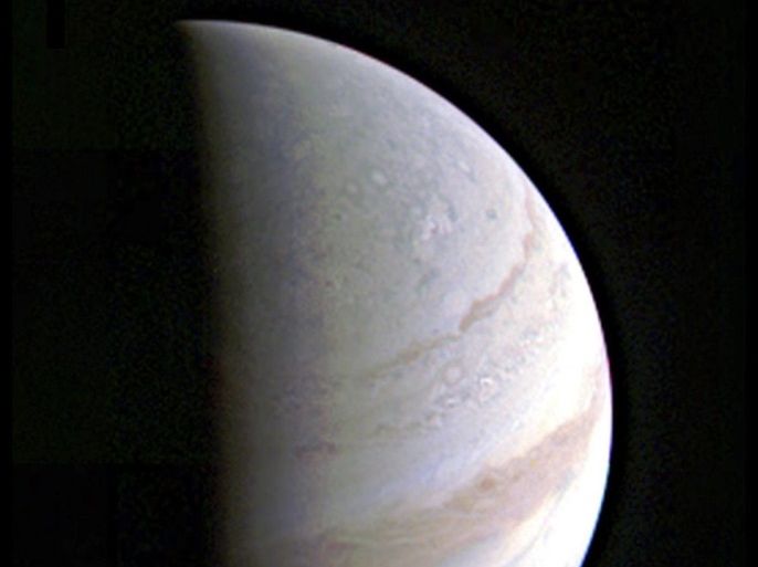 A handout picture made available by NASA on 28 August 2016 shows the surface of the planet Jupiter, as shown from NASA's Juno spacecraft on 27 August 2016 when the craft was 703,000 km away. The craft made its first successful flyby of the planet on 27 August, at one point passing around 4,200 km above the planet's surface. NASA's Jet Propulsion Laboratory, Pasadena, California, USA manages the Juno mission for the principal investigator, Scott Bolton, of Southwest R