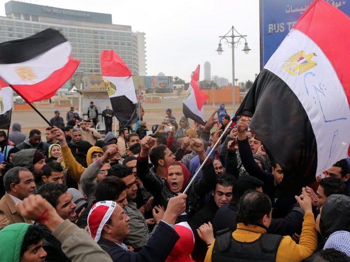 Egyptians celebrate on Tahrir Square in Cairo, Egypt, 25 January 2016, on the eve of the fifth anniversary of the 25 January uprising. Egyptians are planning protests to mark the 2011 uprising known as the Arab Spring will commit a 'crime' and must be punished, Minister of Religious Affairs Mohammed Mokhtar said earlier this month. The warning came after Egyptian secular activists and backers of the banned Muslim Brotherhood group called on Egyptians to hold massive a