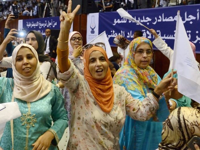 Female supporters wave flags during a speech by the Prime Minister of Morocco and Secretary General of the Party, Justice and Development party (PJD) Abdelilah Benkirane during the electoral campaign for the legislative in Rabat, Morocco, 25 September 2016. The next parliamentary election will be held 07 October 2016.