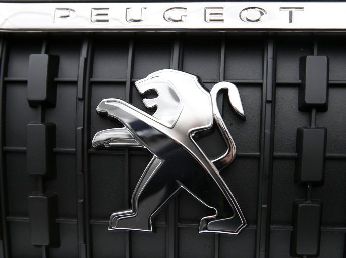The Peugeot logo is seen on the new Peugeot Expert van during a show at Peugeot Citroen PSA Sevelnord carmaker factory in Hordain, northern France, March 30, 2016. REUTERS/Pascal Rossignol