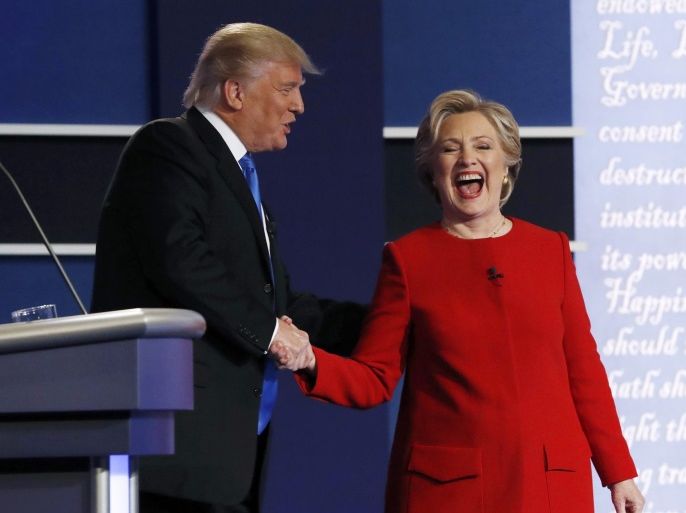 Republican U.S. presidential nominee Donald Trump greets Democratic U.S. presidential nominee Hillary Clinton after their first presidential debate at Hofstra University in Hempstead, New York, U.S., September 26, 2016. REUTERS/Brian Snyder -TPX IMAGES OF THE DAY