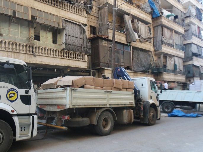 A view shows a truck loaded with aid parcels that were brought into rebel held areas of Aleppo through civil defence vehicles from a newly opened corridor that linked besieged opposition held eastern Aleppo with western Syria that was captured recently by rebels, in Aleppo August 12, 2016. REUTERS/Abdalrhman Ismail