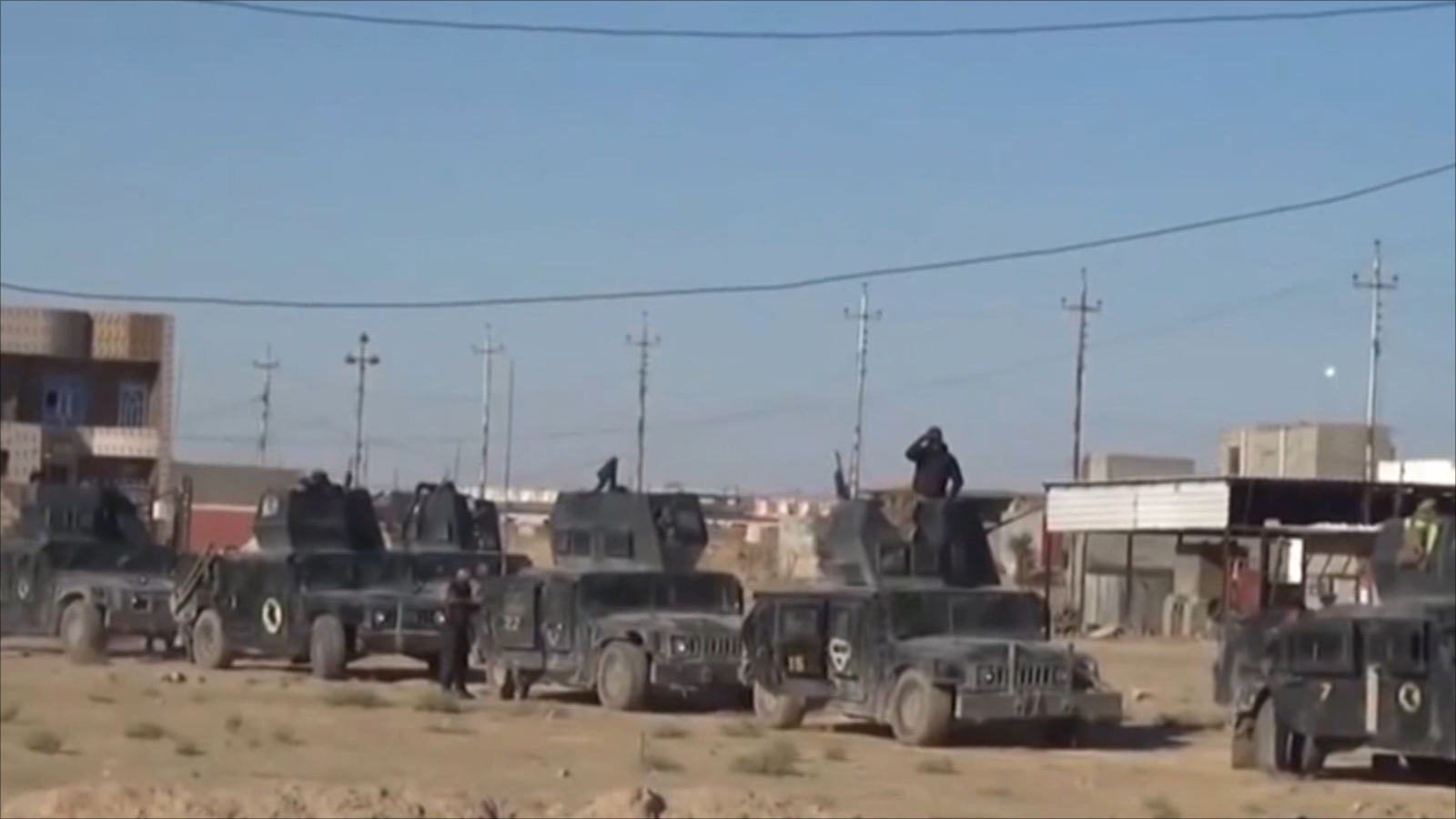 ‪قوات عراقية خلال عملية سابقة في منطقة هيت (غرب الرمادي) بمحافظة الأنبار‬ (الجزيرة-أرشيف)