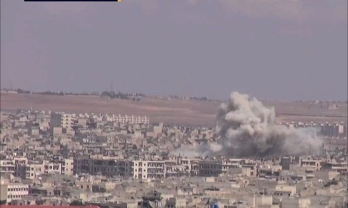 عشرات البراميل المتفجرة والصواريخ الفراغية على حلب
