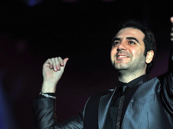 epa01581470 Lebanese singer Wael Jasar performs during a concert in Manama, Bahrain 19 December 2008. Jasar and Egyptian singer Shireen Ahmed appeared in a joint concert that attracted thousands marking Bahrain’s 16 December 2008 National Day. EPA/MAZEN MAHDI