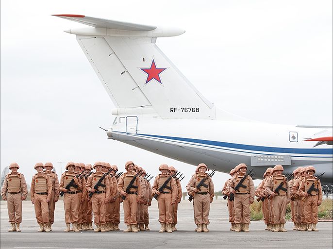 epa05575169 (FILE) A file picture dated 04 May 2016 shows Russian soldiers stand in parade orderduring a rehearsal of Victory Day parade, where they will take part with Syrian unit, at Hmeimym airbase in Latakia province, Syria. The Russian parliament on 07 October 2016 ratified a treaty for the permanent deployement of troops at Hmeimym air base. Hmeimym airbase serves as the base of operation for the Russian air force in Syria. EPA/SERGEI CHIRIKOV