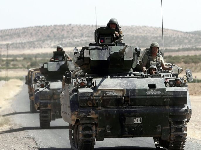 Turkish soldiers with tanks return from Syria to Turkey after a military operation at the Syrian border as part of their offensive against the Islamic State (IS) militant group in Syria, Karkamis district of Gaziantep, Turkey, 27 August 2016. The Turkish army launched an offensive operation against IS in Syria's Jarablus with its war jets and army troops in coordination with the US led coalition war planes.