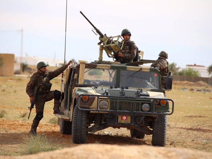Tunisian army soldiers patrol one day after clashes with militants near the border with Libya, in the town of Ben Gardane, Tunisia, 08 March 2016. The final estimate of the death toll from clashes between Tunisian security forces and insurgents in the southern city of Ben Gardane a day ago is 55, Tunisian Premier Habib Essid said in a press conference. A total of 36 insurgents and 12 members of the security forces were killed during the clashes in the city, which is loc