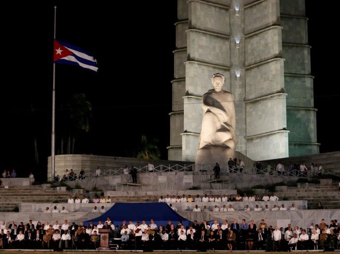 The Cuban flag flies at half-mast as dignitaries gather for a massive tribute to Cuba's late President Fidel Castro in Revolution Square in Havana, Cuba, November 29, 2016. REUTERS/Stringer EDITORIAL USE ONLY. NO RESALES. NO ARCHIVE